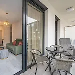 With Garage And Balcony In Center