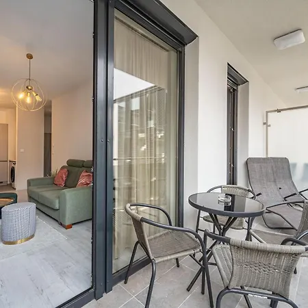 With Garage And Balcony In Center